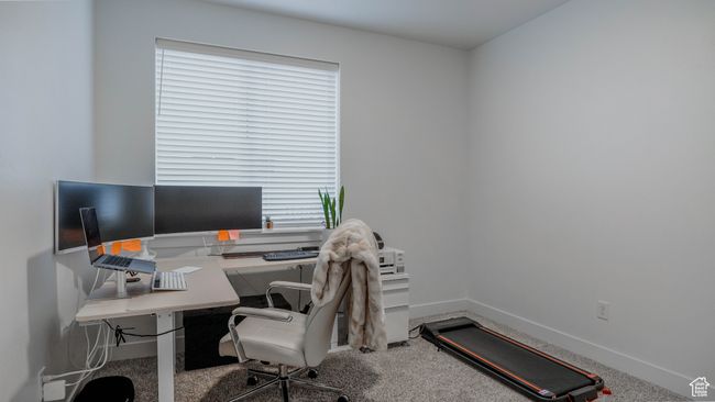 Office area with a wealth of natural light, carpet flooring, and baseboards | Image 15