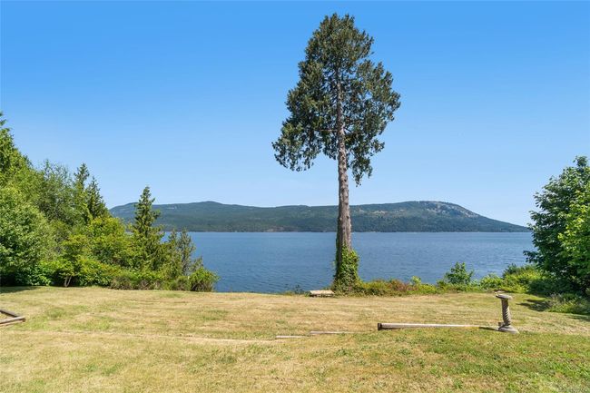 Water view with a mountainous background | Image 56