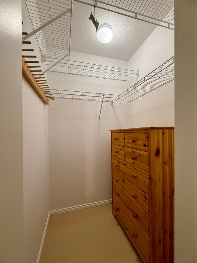 View of walk in closet | Image 11