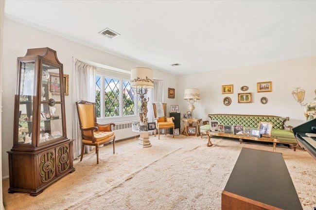Living room featuring radiator | Image 4