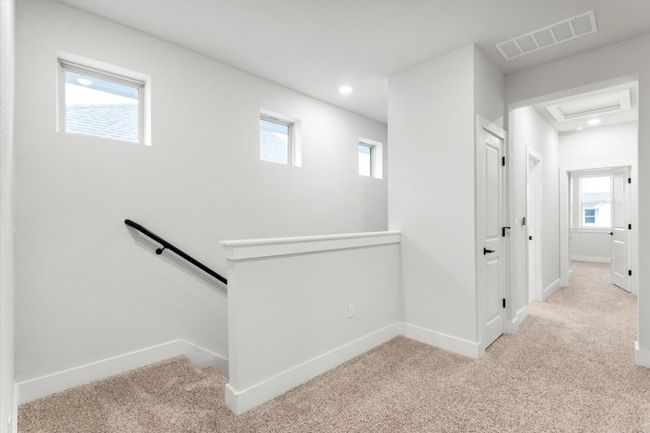 Hallway featuring an upstairs landing, carpet, healthy amount of natural light, and recessed​​‌​​​​‌​​‌‌​‌‌​​​‌‌​​‌‌​‌​​​​​‌ lighting | Image 17