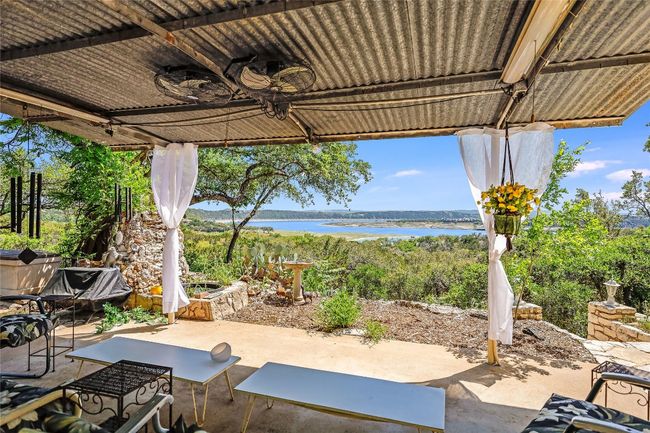 Step outside to the beautiful pergola style patio, relax and be awed by the surrounding beauty and spectacular views. | Image 12