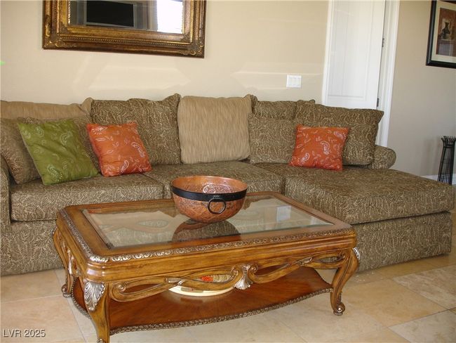 Living room with tile patterned floors | Image 11