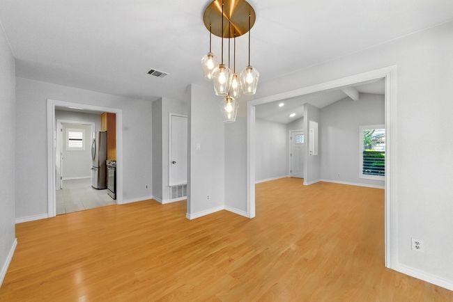 Dining room with view to Living Room and Kitchen | Image 9