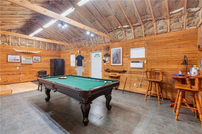 28x16 party barn, heated & cooled with laminate flooring and wood accent walls | Image 14