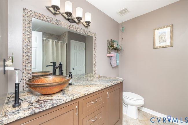 Full bathroom with vanity and a shower with curtain | Image 43
