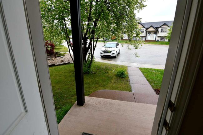 49 Prairie Ridge Close, Townhouse with 2 bedrooms, 2 bathrooms and 3 parking in Blackfalds AB | Image 24