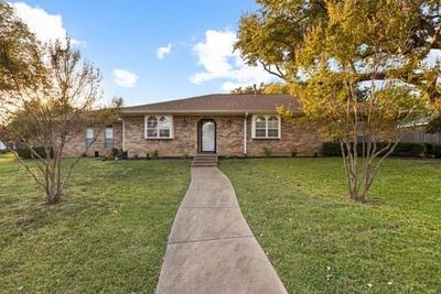 Single story home with a front yard | Image 1