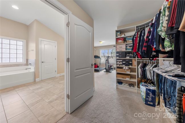 Custom primary closet the size of a bedroom | Image 33