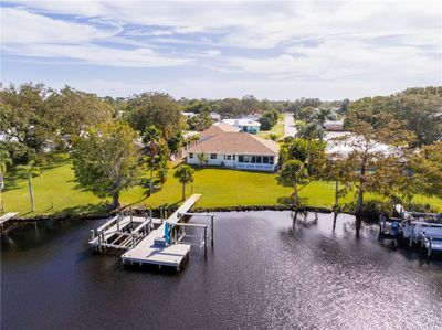 Spacious yard and oversized dock overlooking river | Image 3