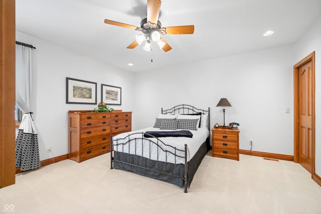 carpeted bedroom with baseboards, recessed lighting, visible vents, and a ceiling fan | Image 94