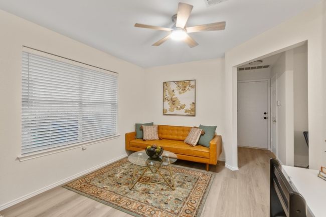 A secondary living area make this the perfect game room/office or even a play room! | Image 14