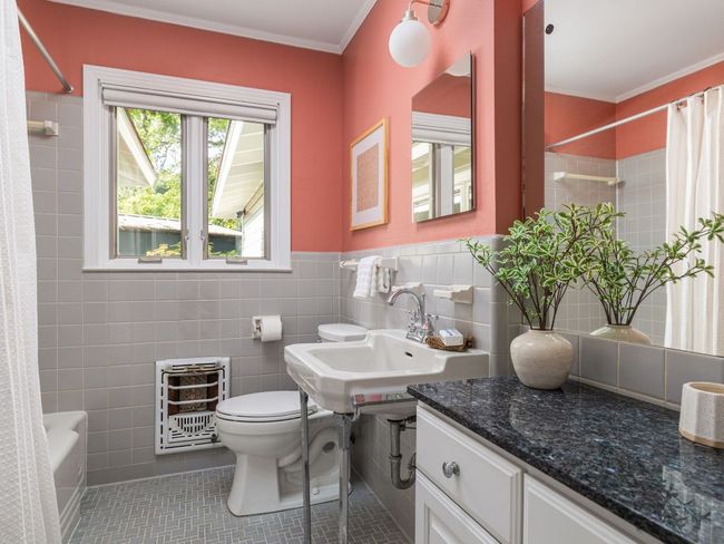 Bathroom featuring tile walls, shower / bath combo, and tile patterned floors | Image 21