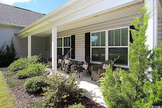 Rear view of property with a patio and covered porch | Image 31