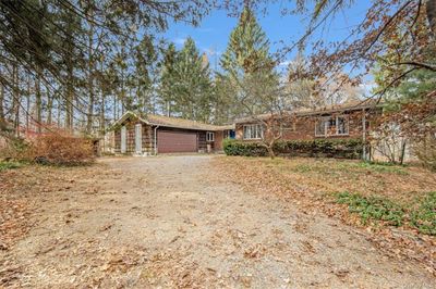 Ranch-style home with a garage | Image 2