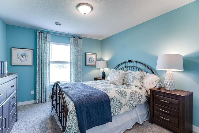 Included finished lower level with family room, bedroom, and full bath. Photo of model home. Colors and options may vary. Ask Sales Agent for details. | Image 37