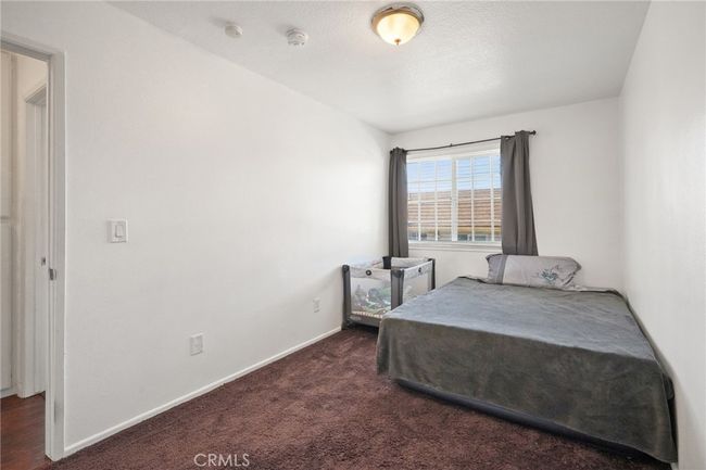 Upstairs: Bedroom 3 with wall-to-wall closet | Image 13