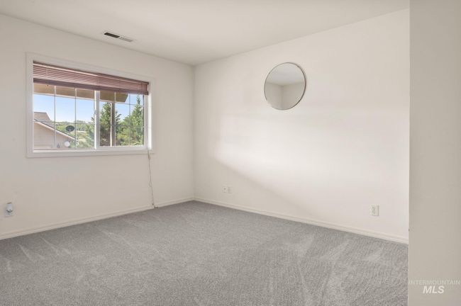 Empty room with carpet flooring and baseboards | Image 23