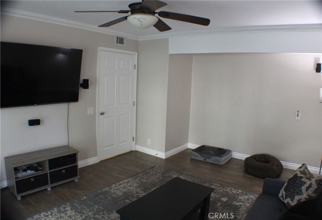 Downstairs bedroom closet area No doors | Image 13