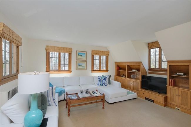 Family Room/Den with built-ins, full bath in hallway | Image 26