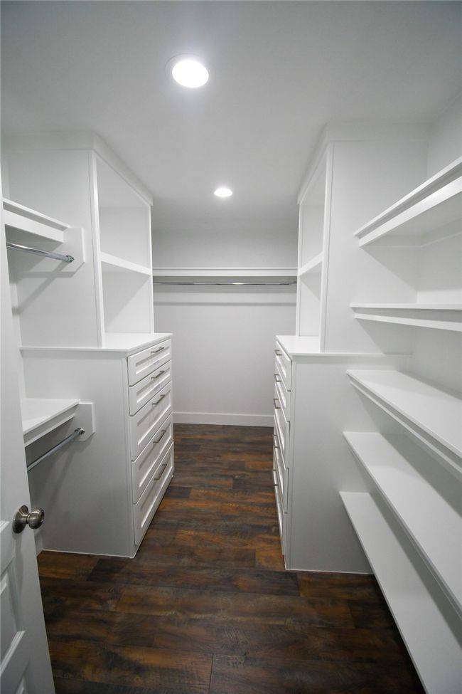 Primary Bedroom Closet with Quality Built-ins | Image 21