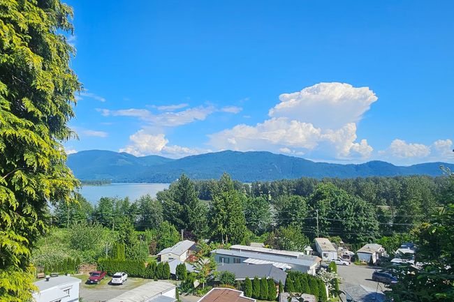 Mountain view with a nearby body of water | Image 5