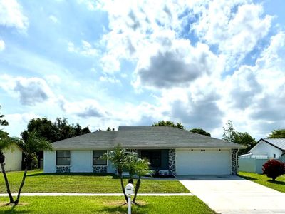 142 La Mancha Avenue, House other with 3 bedrooms, 2 bathrooms and null parking in Royal Palm Beach FL | Image 1