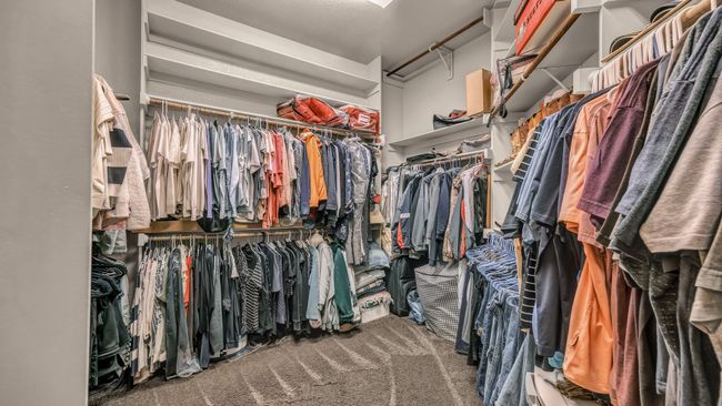 Spacious closet featuring carpet | Image 27