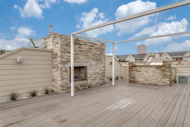 Wooden deck featuring cooling unit | Image 16