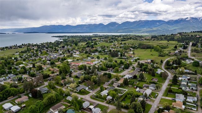 Bird's eye view with a water and mountain view | Image 9