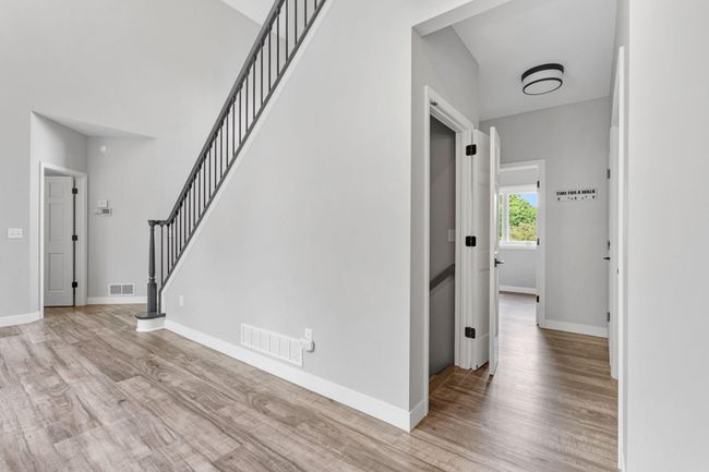 Lower level entrance is located off the kitchen hallway. | Image 29