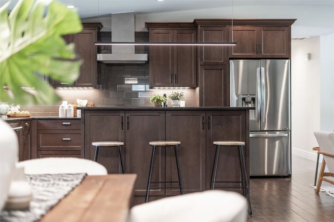 The open floor plan makes it easy to stay connected throughout the main living area. | Image 15