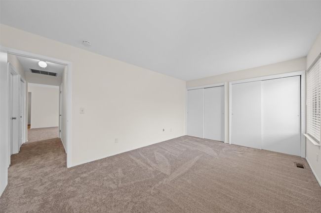 Two closets are found in the primary bedroom | Image 17