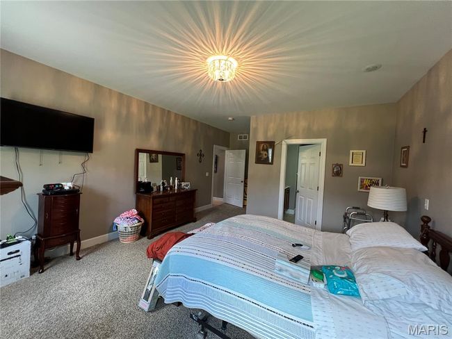 Bedroom featuring carpet floors | Image 11
