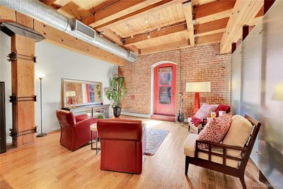 Living room w/door to balcony | Image 1