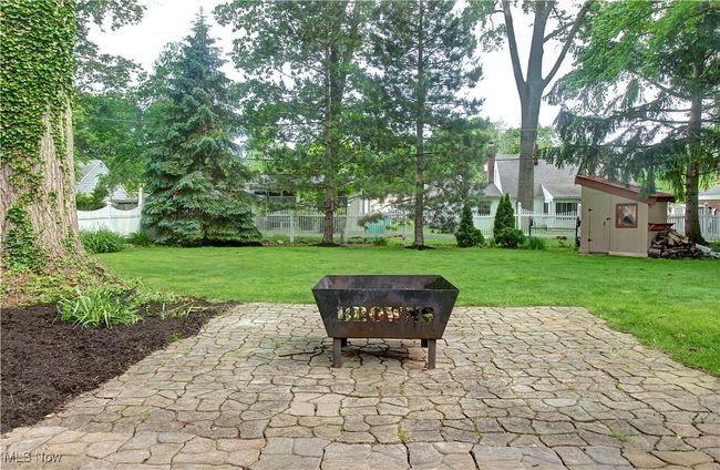View of patio featuring a storage shed | Image 40