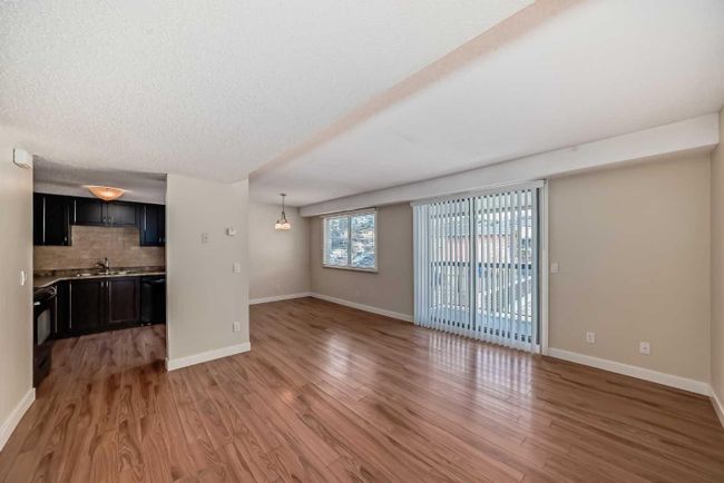 1003 - 2200 Woodview Drive Sw, Home with 2 bedrooms, 1 bathrooms and 1 parking in Calgary AB | Image 2