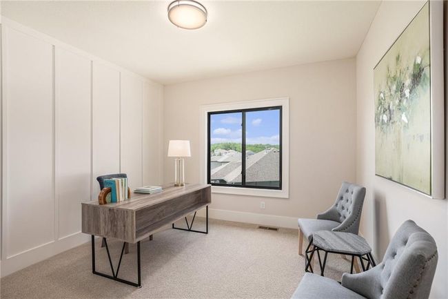 Office space featuring light carpet and baseboards | Image 23