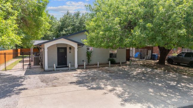 View of front of property with brick siding and a gate | Image 36