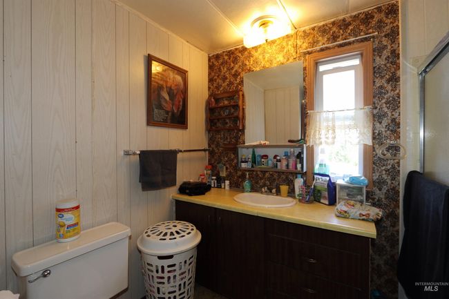 Full bathroom featuring vanity and an enclosed shower | Image 17