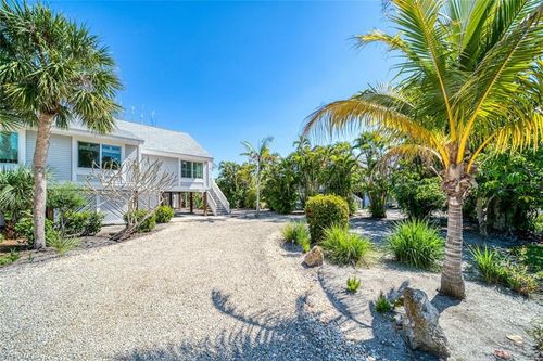 1446 Sandpiper Cir, SANIBEL, FL, 33957-3629 | Card Image