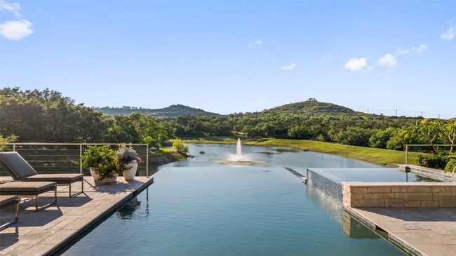 Dock with a water and mountain view | Image 4