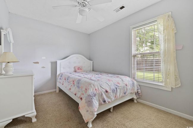 Carpeted bedroom featuring baseboards and ceiling​​‌​​​​‌​​‌‌​‌‌​​​‌‌​​‌‌​‌​​​​​‌ fan | Image 8