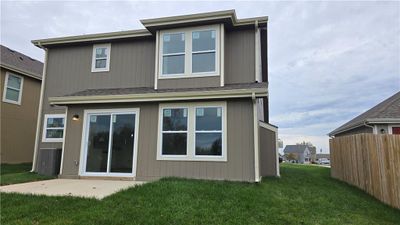 Back of house featuring a yard and a patio area | Image 2