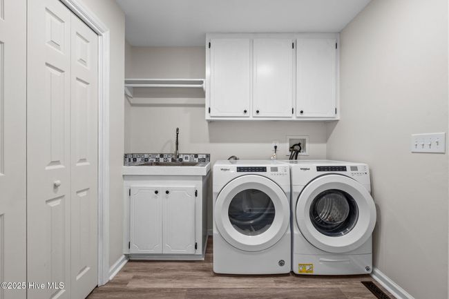 laundry room with storage and sink | Image 33