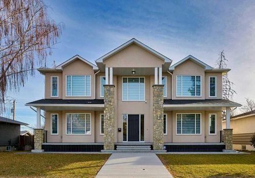 54 Malibou Road Sw, Home with 5 bedrooms, 3 bathrooms and 3 parking in Calgary AB | Card Image