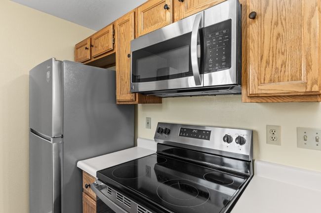 Kitchen with New Range, and newer Microwave | Image 9