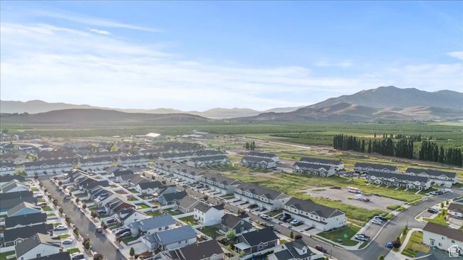 Aerial view of property and surrounding area with a mountain backdrop and nearby suburban area | Image 38