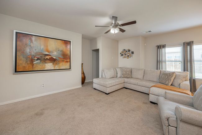 Living room featuring carpet floors and a ceiling fan | Image 29