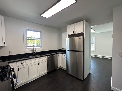 2f-210 N Main St, Woonsocket, RI, 02895-3140 | Card Image